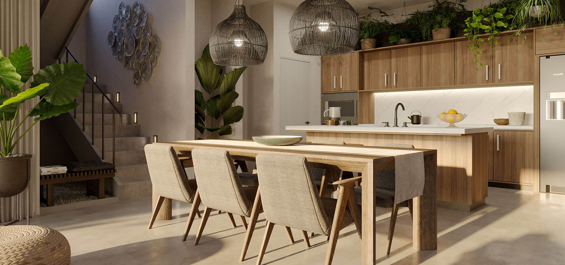 Kitchen and dining room illuminated by natural light from Acquarello Dominical residence